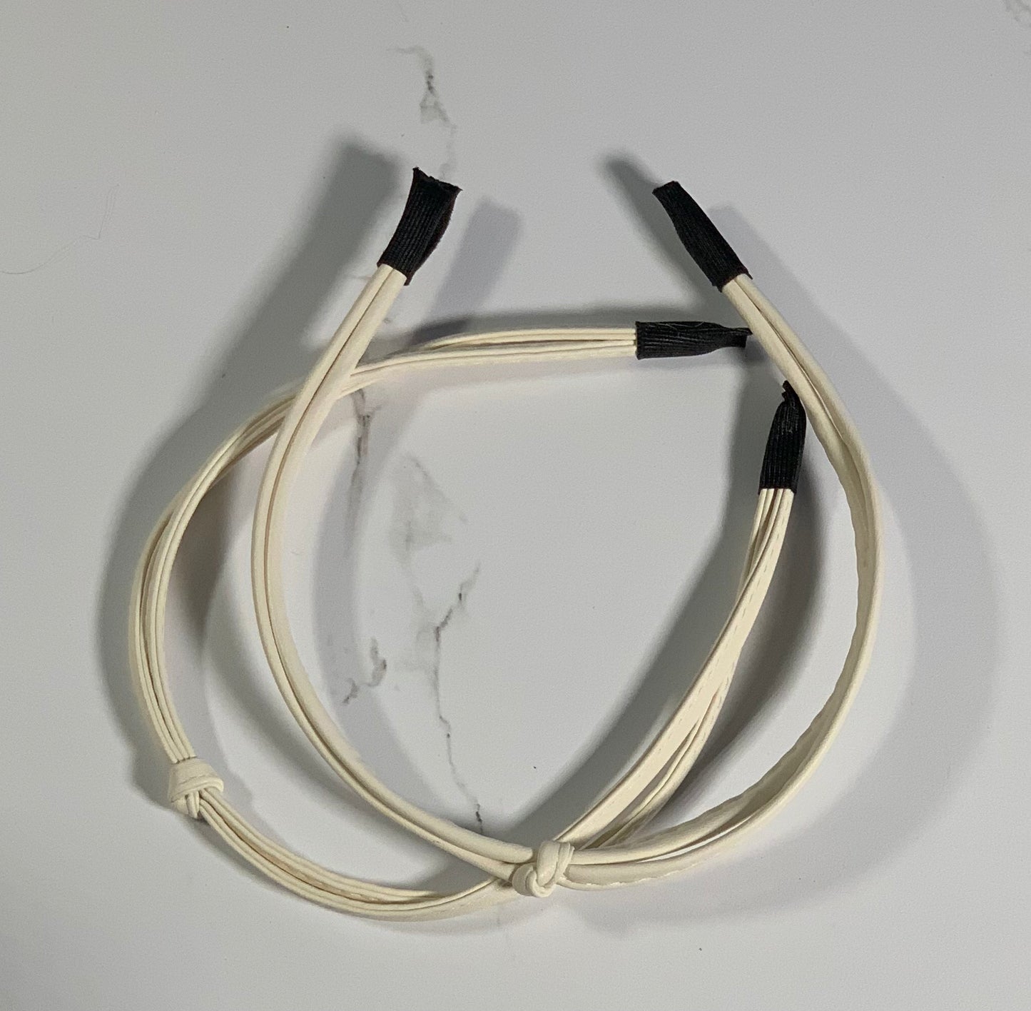 Thin vegan leather knot headband