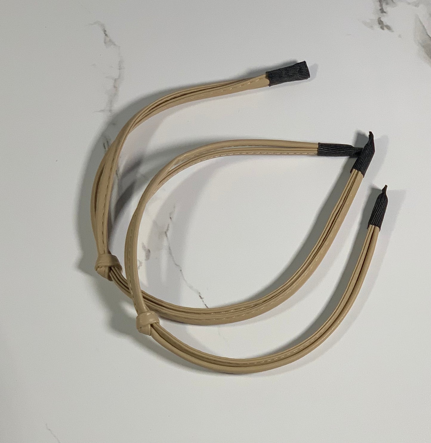 Thin vegan leather knot headband