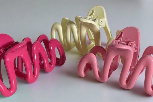 curvy hair clips in bubblegum, Barbie pink and a creamy vanilla